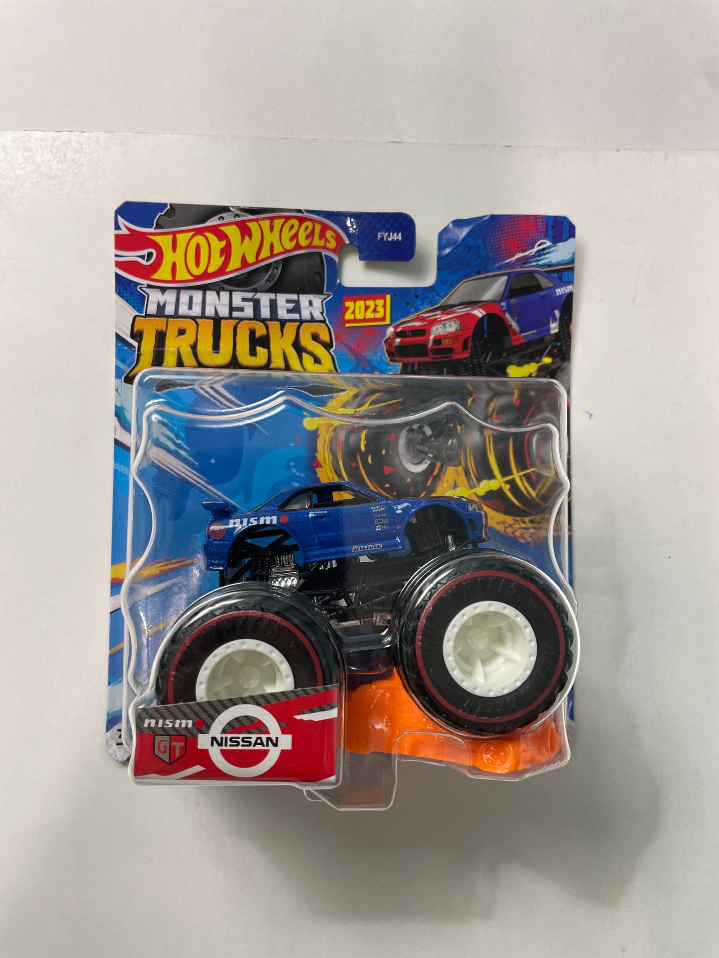 Hot Wheels 1/64 Monster Trucks Treasure Hunt Nissan Blue - Damaged Card
