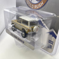 Greenlight 1/64 Hobby Exclusive Colorado 76 Gold Rush 1976 Ford Bronco White & Gold - Damaged Box