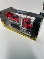 Maisto Muscle Machines 1/64 Muscle Transports 1980 Mack R685st Flatbed & Lamborghini Countach Red