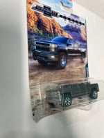 Matchbox 1/64 Chevrolet Trucks ‘14 Chevy Silverado Grey - Damaged Card