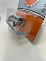 Greenlight 1/64 Gulf 1986 Jeep Cherokee Wagoneer Orange & Blue