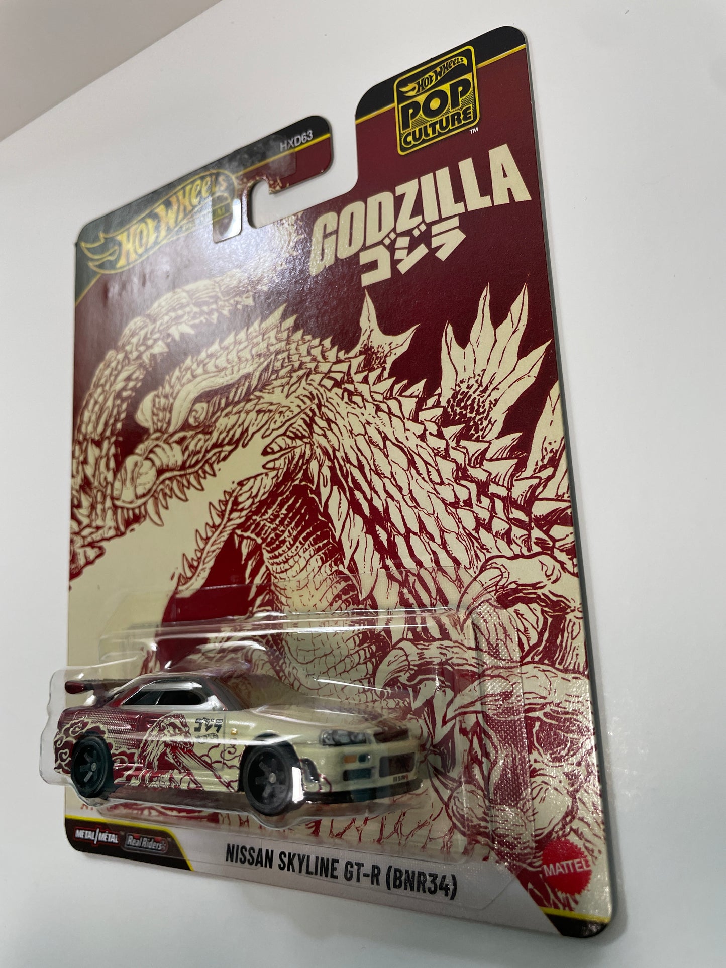 Hot Wheels 1/64 Pop Culture Godzilla Nissan Skyline GT-R (BNR34) Red - JHW90 - Damaged Box