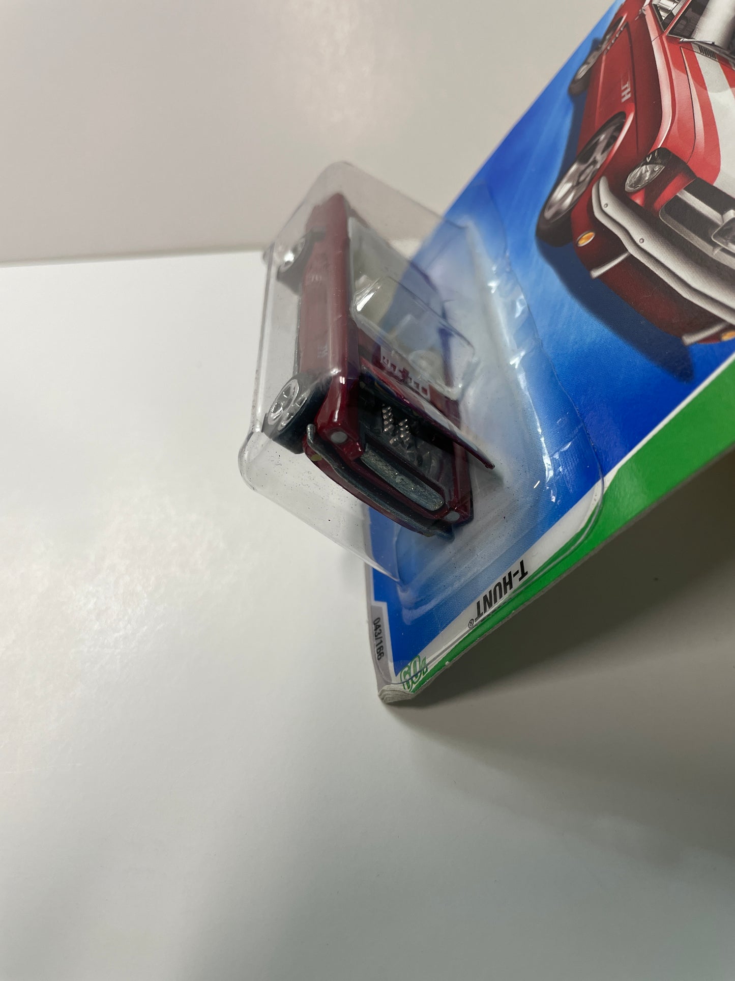 Hot Wheels 1/64 Treasure Hunt Ford Mustang Red - damaged card