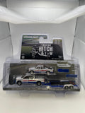 Greenlight 1/64 Racing Hitch & Tow 2023 Chevrolet Silverado 1500 & 1989 Chevrolet S-10 Baja w/ Flatbed Trailer White & Blue