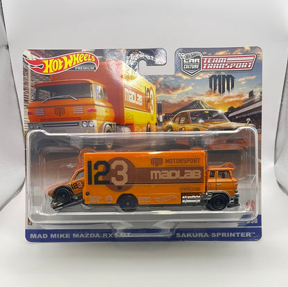 Hot Wheels 1/64 Car Culture Team Transport Mad Mike Mazda RX3 GT w/ Sakura Sprinter Orange