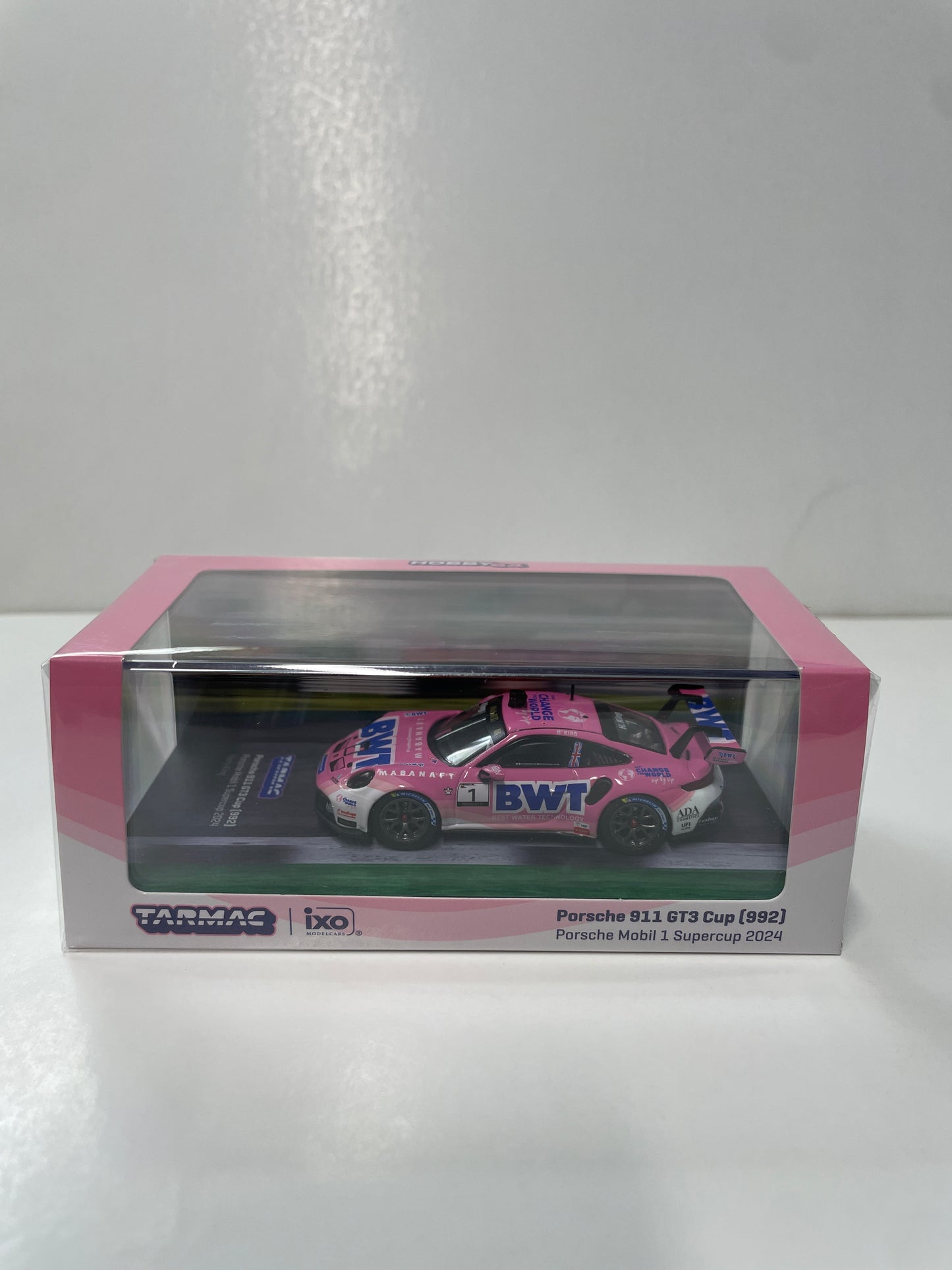 Tarmac Works x iXO Models 1/64 Porsche 911 GT3 Cup (992) Porsche Mobil 1 Supercup 2024 #01 Pink - HOBBY64 - T64-093-24PSC01