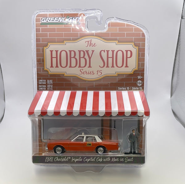 1/64 Greenlight The Hobby Shop Series 15 1981 Chevrolet Impala Capital Cab w/ Man In Suit Orange