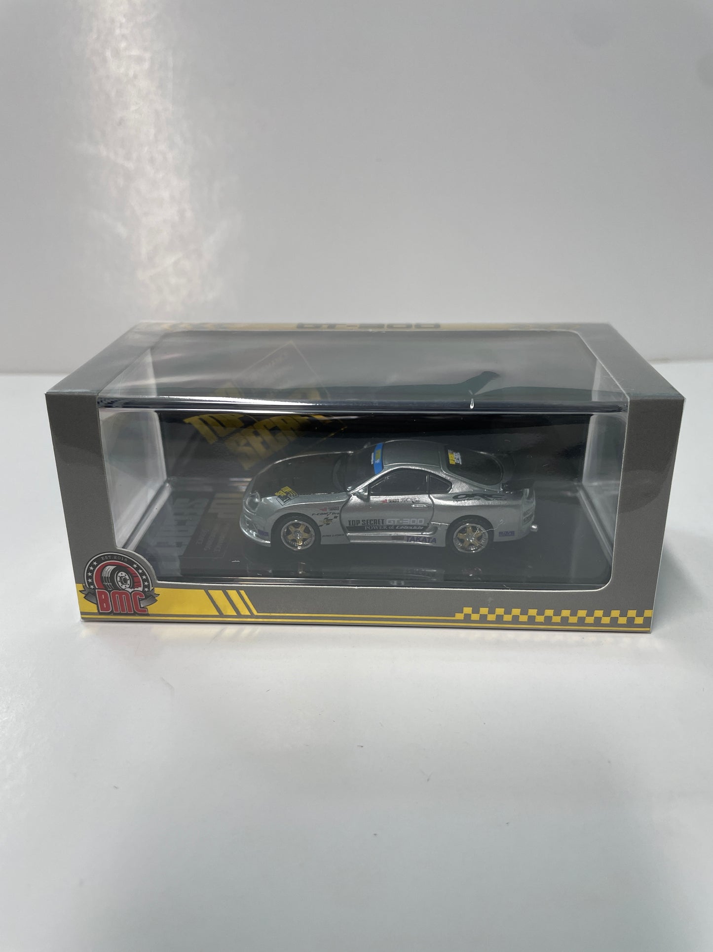 BM Creation 1/64 Top Secret GT-300 Toyota Supra (JZA80) MIAS 20th Ann. Edition Silver - 64B0435 - Damaged Box