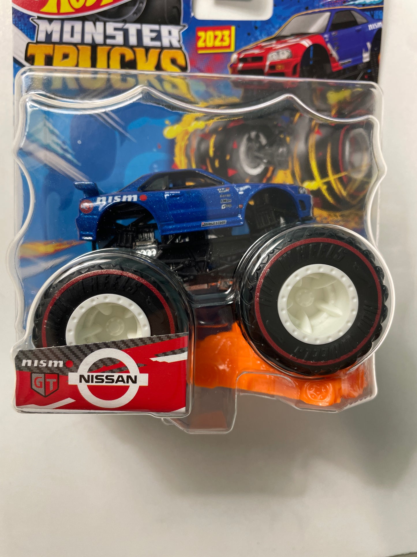 Hot Wheels 1/64 Monster Trucks Treasure Hunt Nissan Blue - Damaged Card