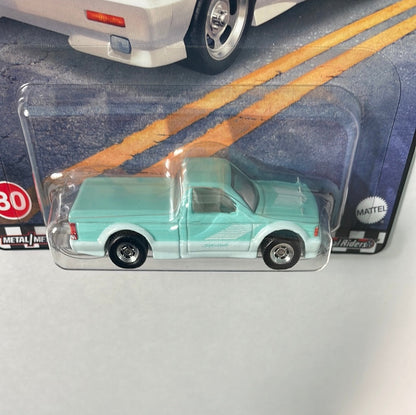 Hot Wheels 1/64 HW Boulevard ‘91 GMC Syclone Blue - Damaged Box