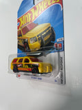 Hot Wheels 1/64 ‘07 Chevy Tahoe Yellow