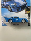 Hot Wheels 1/64 Porsche 934.5 Blue - Damaged Card