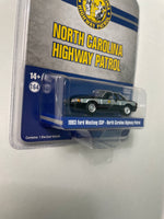 Greenlight x Acme 1/64 1993 Ford Mustang SSP - North Carolina Highway Patrol Black & Silver