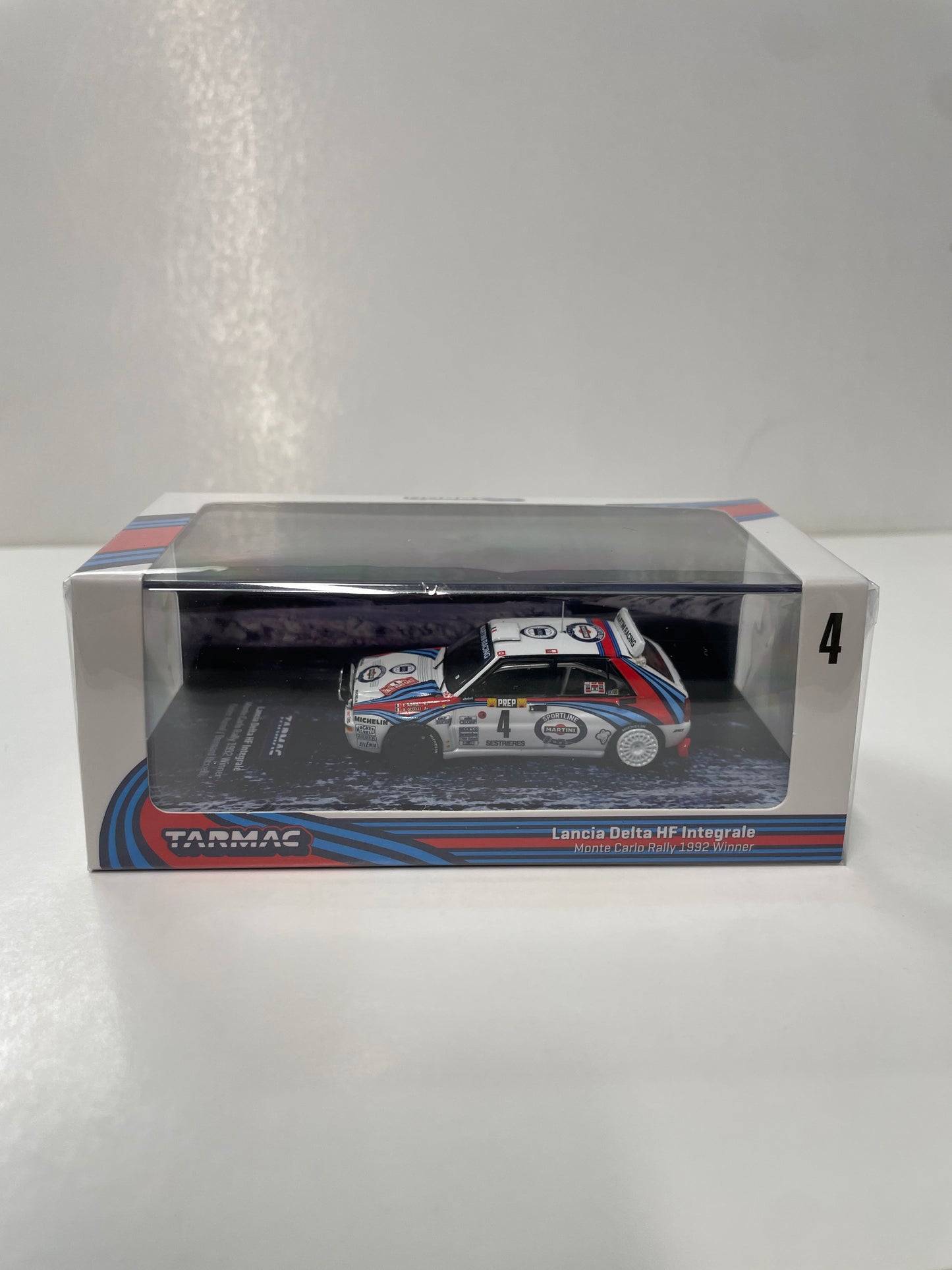Tarmac Works 1/64 Lancia Delta HF Integrale Monte Carlo Rally 1992 #04 Winner Didier Auriol / Bernard Occelli White - HOBBY64 - T64-049-92MCR04