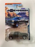 Matchbox 1/64 Chevrolet Trucks ‘14 Chevy Silverado Grey - Damaged Card