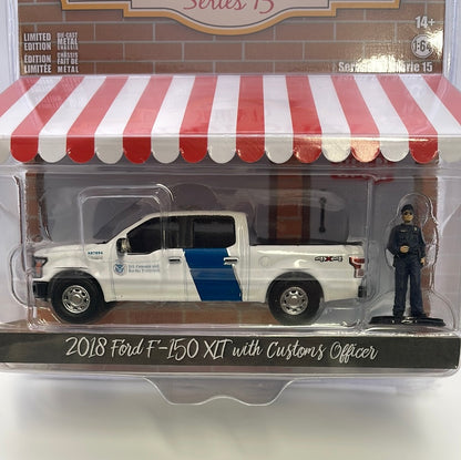 1/64 Greenlight The Hobby Shop Series 15 2018 Ford F-150 XLT w/ Customs Officer White
