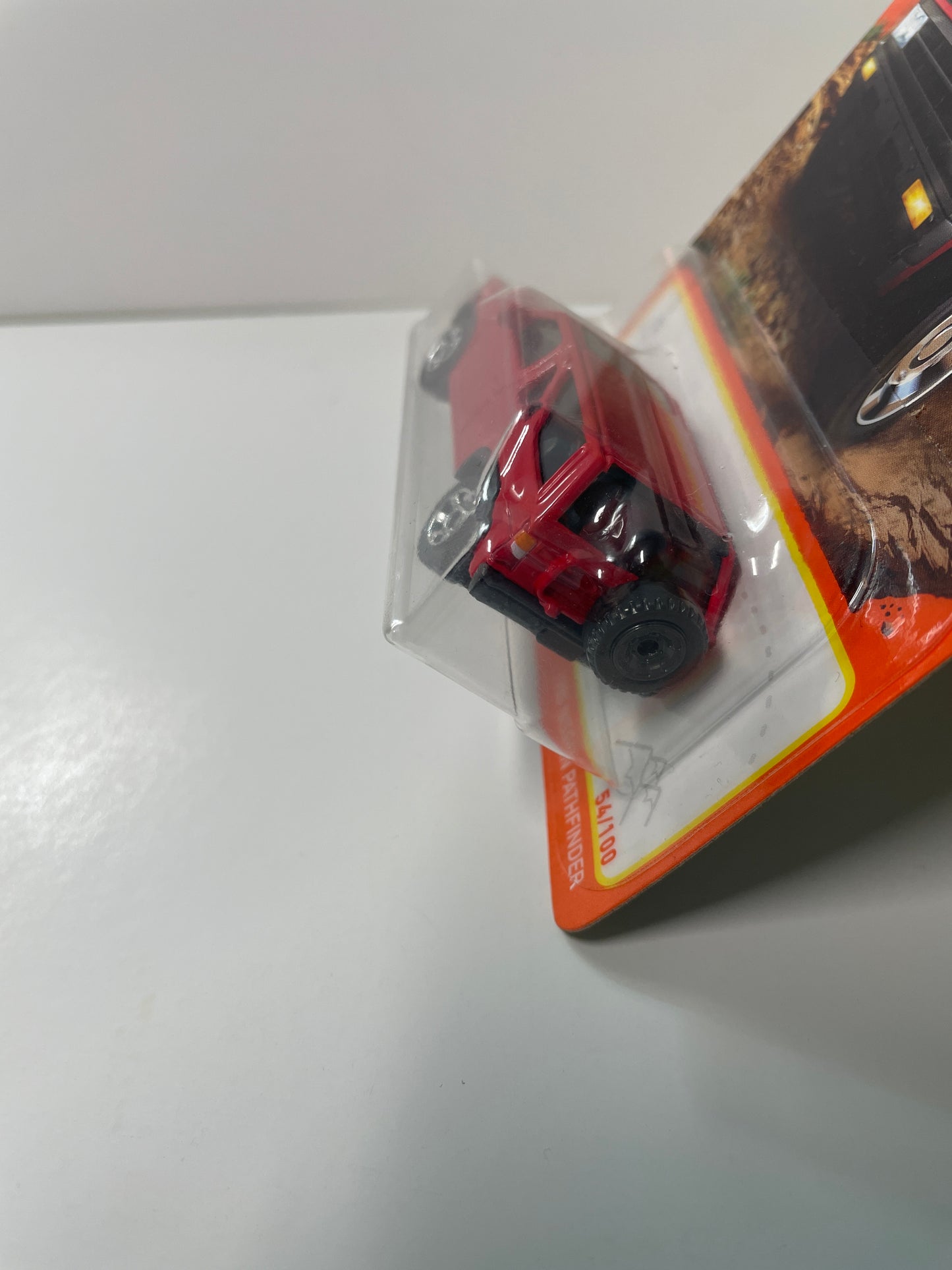 Matchbox 1/64 1985 Nissan Pathfinder Red - Damaged Card