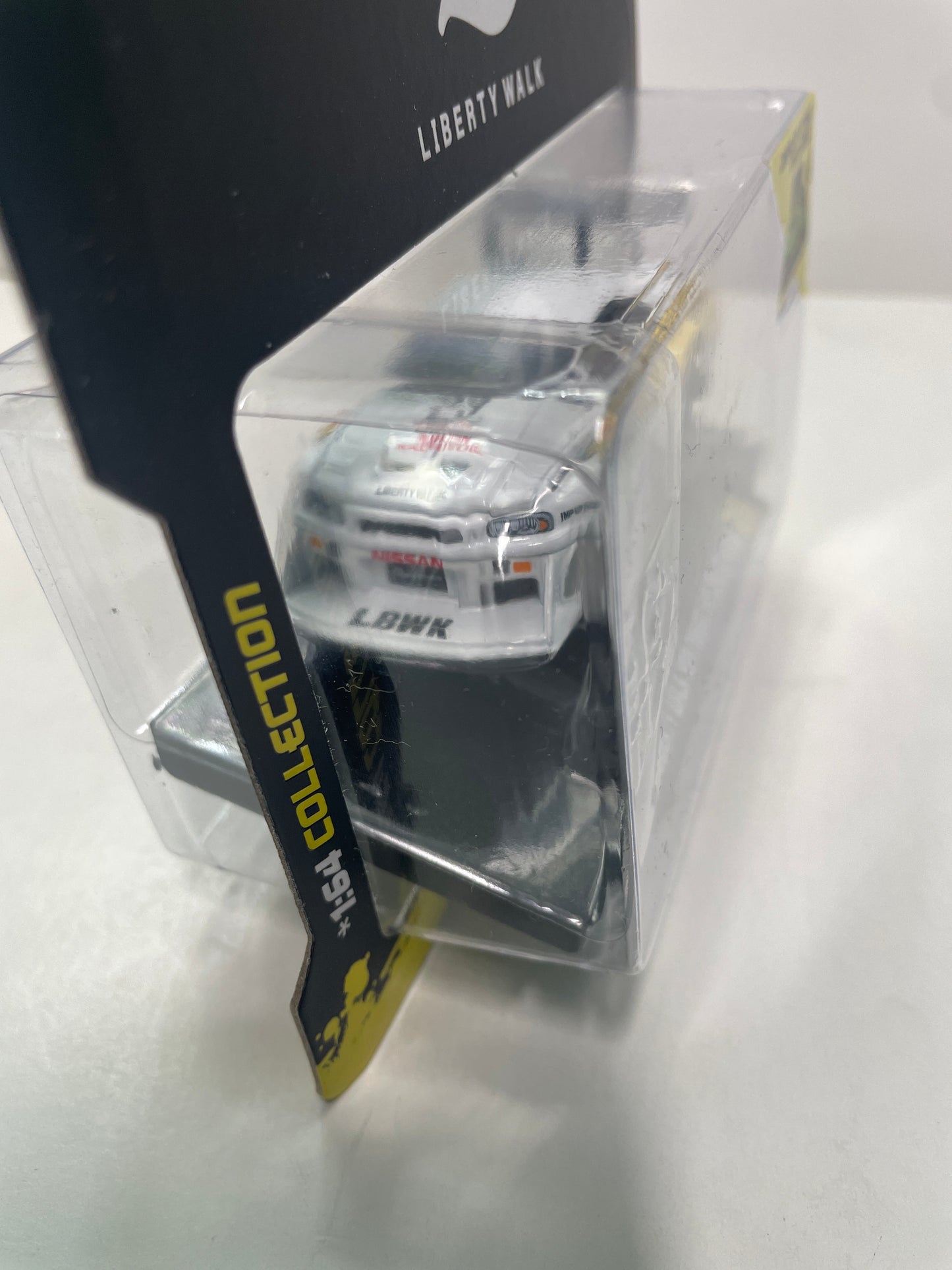 Maisto Muscle Machines 1/64 Liberty Walk 1999 Nissan Skyline GT-R R34 #23 White & Yellow - Damaged Card