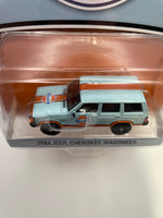 Greenlight 1/64 Gulf 1986 Jeep Cherokee Wagoneer Orange & Blue