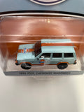 Greenlight 1/64 Gulf 1986 Jeep Cherokee Wagoneer Orange & Blue