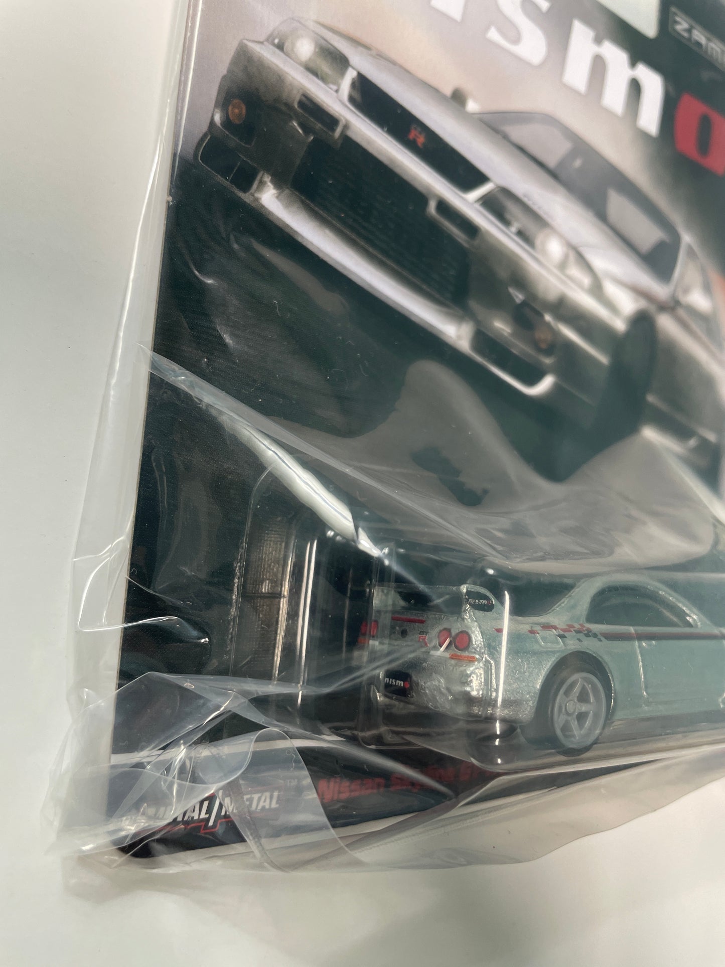 Hot Wheels 1/64 2026 Tokyo Auto Salon Hot Wheels Zamac Nismo Nissan Skyline GT-R (BCNR33) Nismo R-Tune - JCP41 - Damaged Box