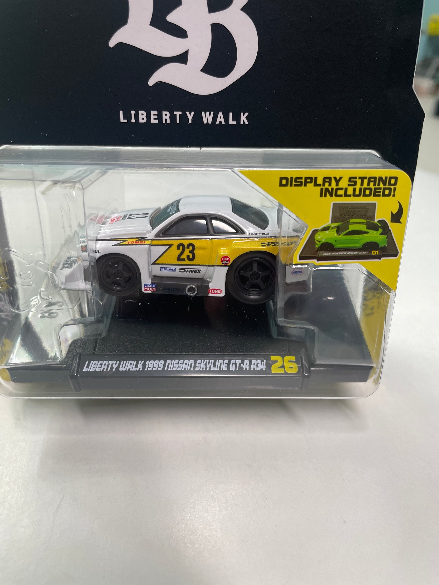 Maisto Muscle Machines 1/64 Liberty Walk 1999 Nissan Skyline GT-R R34 #23 White & Yellow - Damaged Card