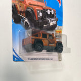 Hot Wheels 1/64 ‘15 Land Rover Defender Double Cab Orange - Damaged Card