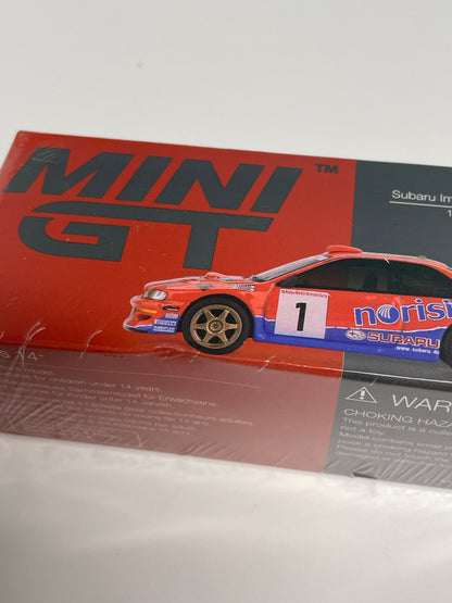 Mini GT 1/64 Subaru Impreza WRC97 #1 1999 DRM Champion Red & Blue - MGT01140 - Damaged Box