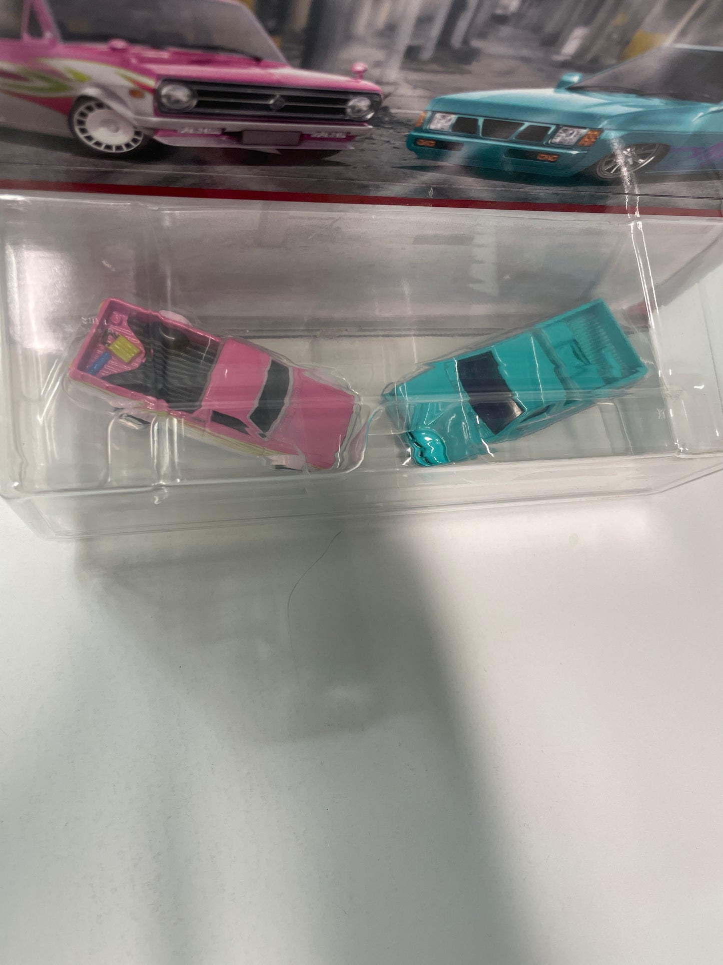 Hot Wheels 1/64 Premium Car Culture 2 Pack 1975 Datsun Sunny Truck (B120) & Custom ‘93 Nissan Hardbody (D21)