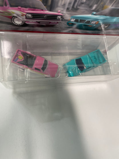 Hot Wheels 1/64 Premium Car Culture 2 Pack 1975 Datsun Sunny Truck (B120) & Custom ‘93 Nissan Hardbody (D21)