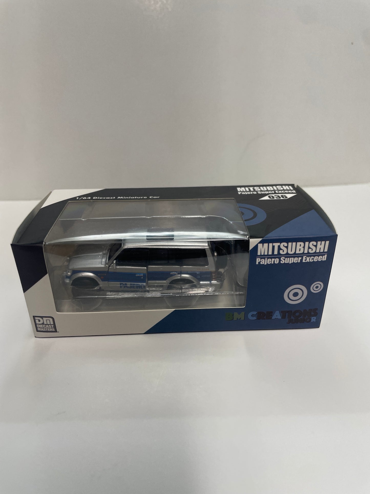BM Creations 1/64 Mitsubishi Pajero Super Exceed Silver & Blue - Damaged Box