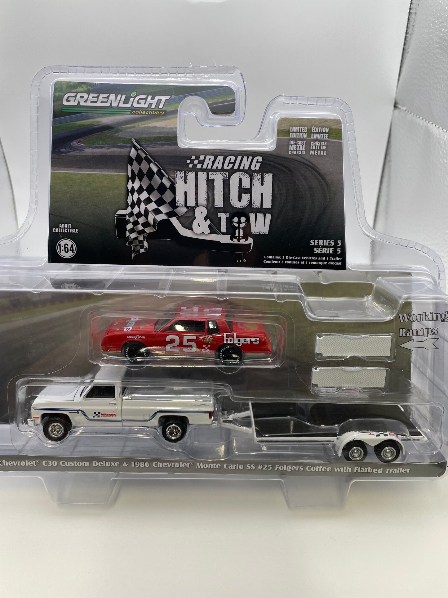 Greenlight 1/64 Racing Hitch & Tow 1986 Chevrolet C30 Custom Deluxe & 1986 Chevrolet Monte Carlo SS #25 Folgers Coffee w/ Flatbed Trailer