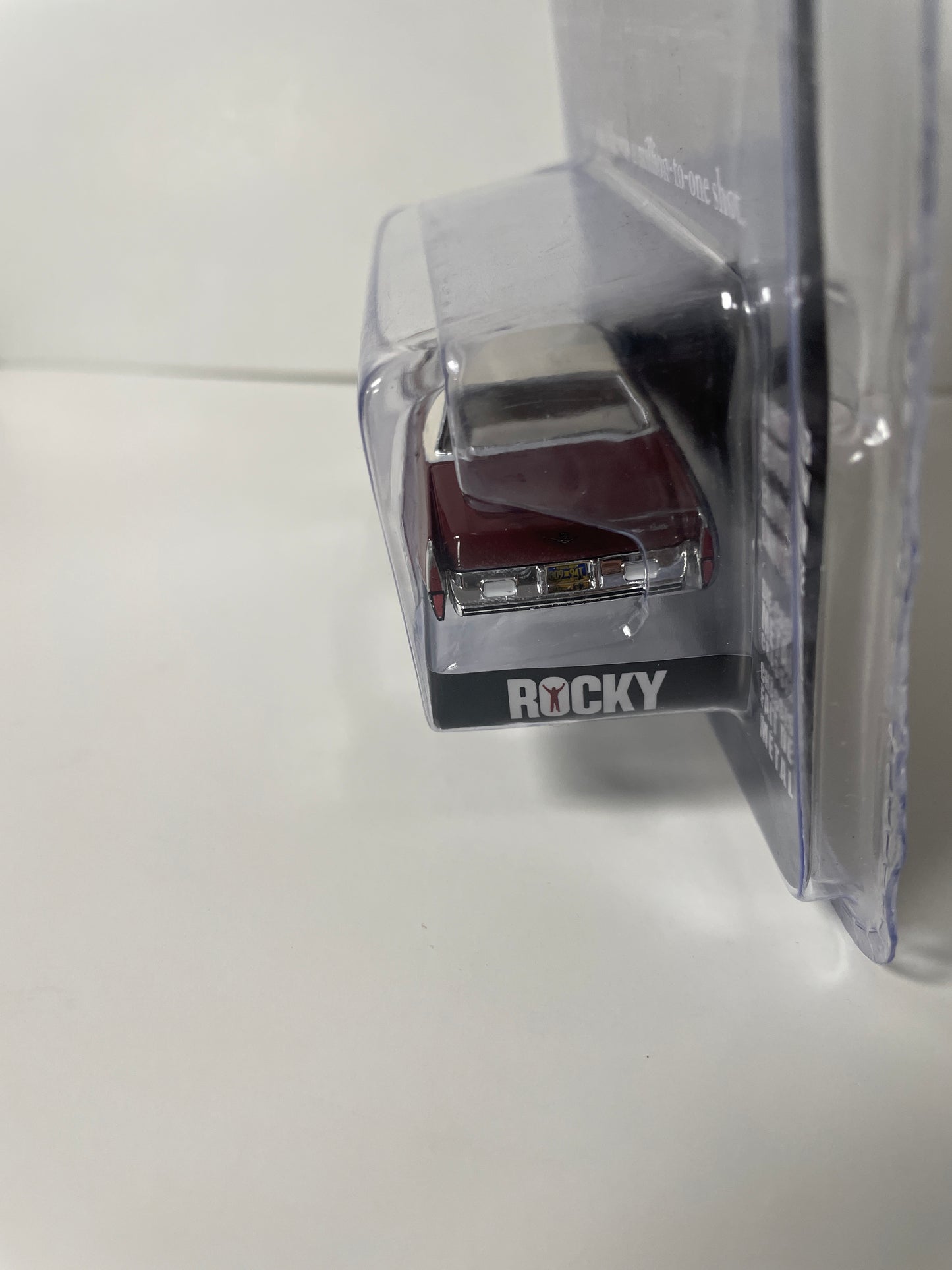 Greenlight 1/64 Hollywood Rocky 1973 Cadillac Sedan deVille Red - 44950A