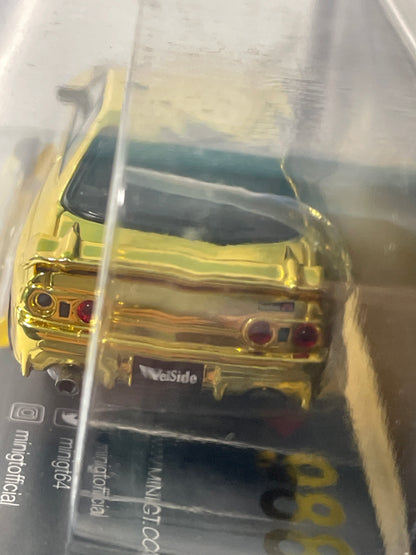 Mini GT 1/64 2026 Tokyo Auto Salon Nissan Skyline GT-R (R32) VeilSide Combat C-1 Gold Chrome & XL T-Shirt - MGT00988-BL - Damaged Car (Read description)