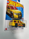 Hot Wheels 1/64 ‘07 Chevy Tahoe Yellow - Damaged Card