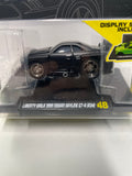 Maisto Muscle Machines 1/64 Liberty Walk 1999 Nissan Skyline GT-R R34 Black - Damaged Card