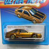 Hot Wheels 1/64 Ultra Hots Toyota AE86 Sprinter Trueno Gold - Damaged Card