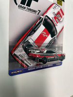 Hot Wheels 1/64 Pop Culture Gran Turismo 7 Nissan Skyline GT-R (BNR34) White & Black - Damaged Card