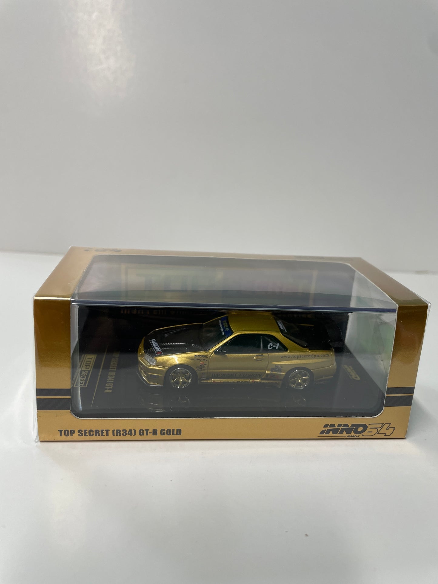 Inno64 1/64 Top Secret (R34) Nissan GT-R Gold