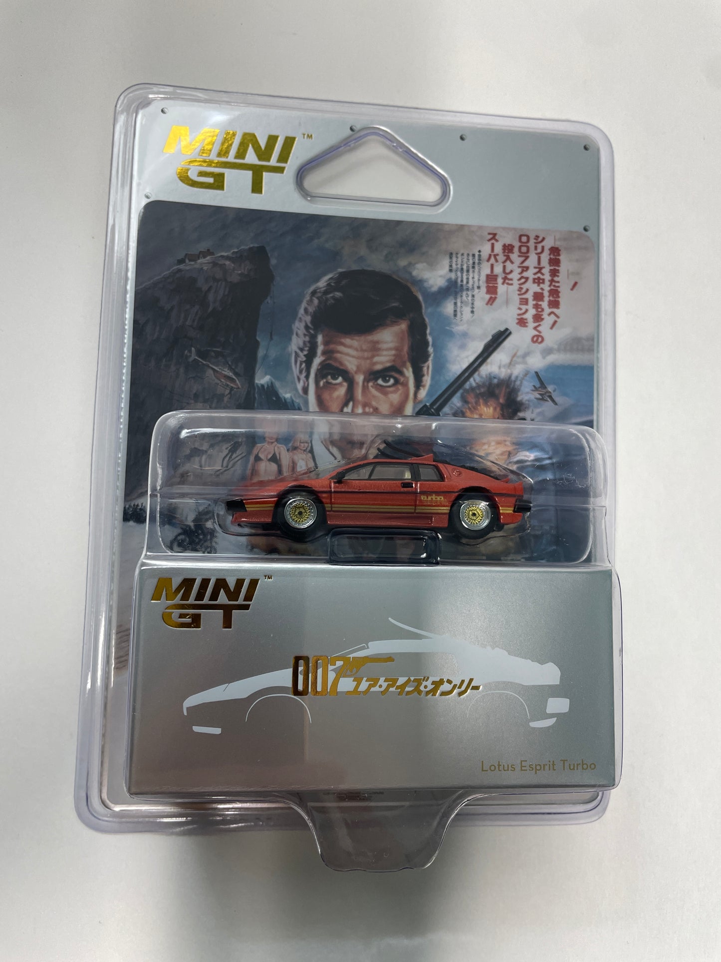 Mini GT 1/64 Lotus Esprit Turbo Copper Fire Metallic "For Your Eyes Only" Japanese Blister Packaging Orange - MGT00912-007J