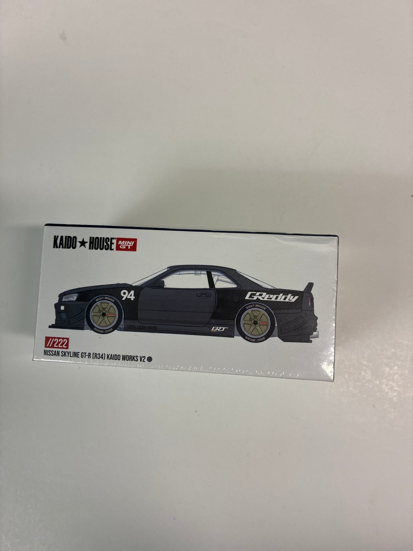 Mini GT x Kaido House 1/64 Nissan Skyline GT-R (R34) Kaido Works GReddy V2 Black - KHMG222 - Damaged Box