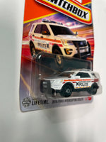 Matchbox 1/64 2016 Ford Interceptor Utility Police Emergency White - Damaged Card