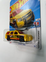 Hot Wheels 1/64 ‘07 Chevy Tahoe Yellow - Damaged Card