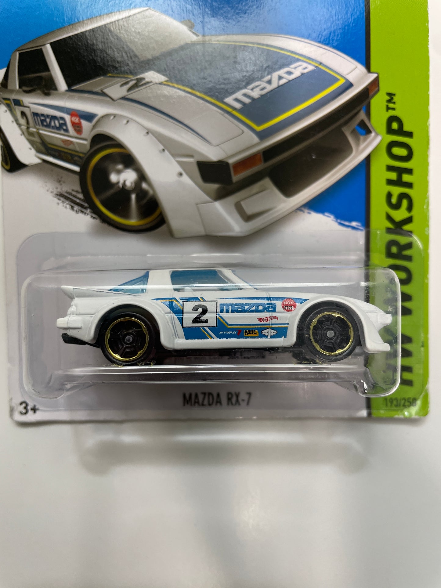 Hot Wheels 1/64 Mazda RX-7 White & Blue - Damaged Card