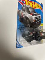 Hot Wheels 1/64 Zamac ‘87 Dodge D100 - Damaged Card