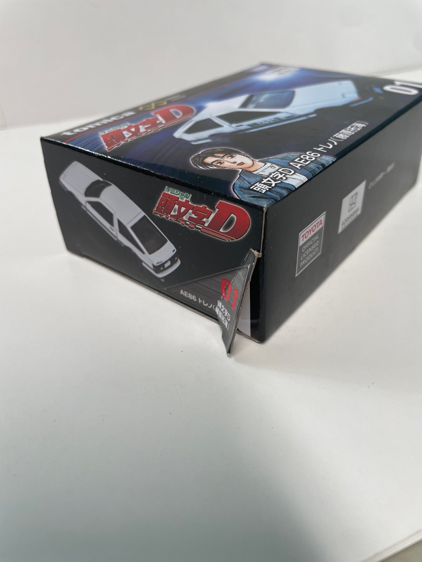 Tomica Premium Unlimited 1/64 #01 Initial D AE86 Trueno (Takumi Fujiwara) White 29766 - Damaged Box