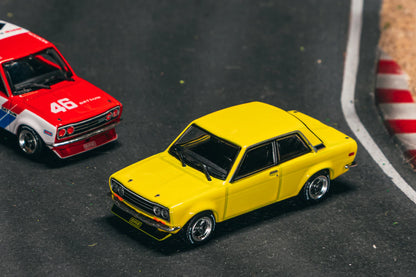 Tarmac Works 1/64 BRE Datsun 510 Brock Buster Peter Brock – USA Special Edition Yellow ROAD64 - T64R-052-BB