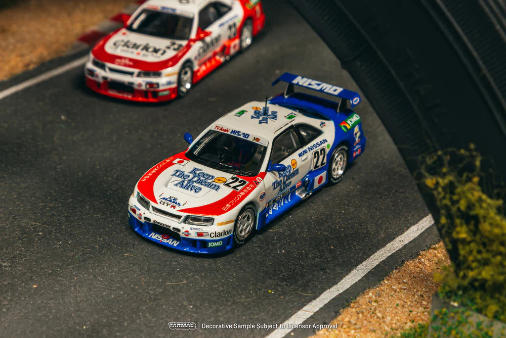 Tarmac Works 1/64 Nissan NISMO GT-R LM 24h of Le Mans 1995 n22 - HOBBY64 White & Blue - T64-067-95LM22