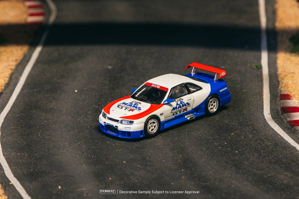 Tarmac Works 1/64 Nissan NISMO GT-R LM (1995 Launch Ver.) - HOBBY64 White & Blue - T64-067-TC - Damaged Box