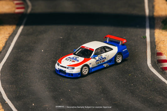 Tarmac Works 1/64 Nissan NISMO GT-R LM (1995 Launch Ver.) - HOBBY64 White & Blue - T64-067-TC - Damaged Box